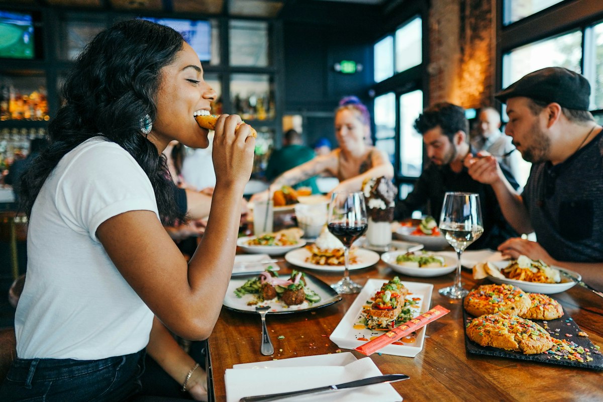Guests settling the bill at their table